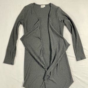 Tree kisses cardigan.